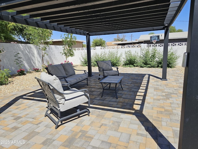 view of patio / terrace with a fenced backyard, a pergola, and an outdoor hangout area