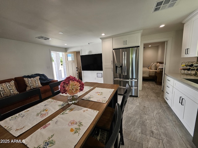 dining room featuring recessed lighting and visible vents