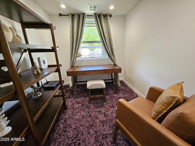 carpeted office space featuring recessed lighting, baseboards, and visible vents