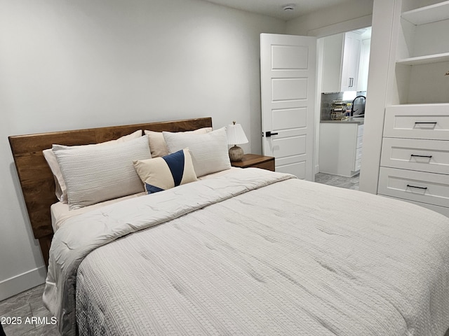 bedroom with baseboards