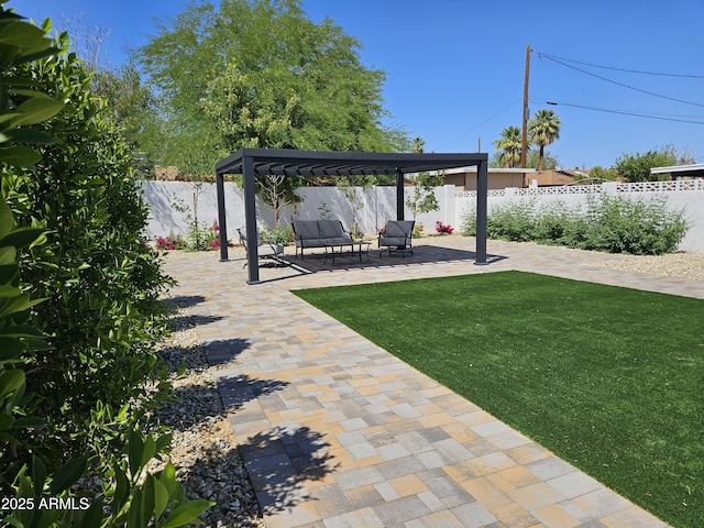 view of yard featuring an outdoor hangout area, a patio, a gazebo, and a fenced backyard
