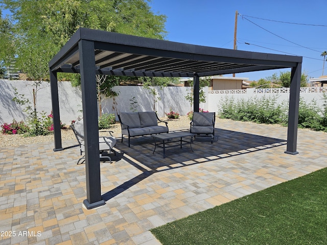 view of patio / terrace featuring an outdoor living space and a fenced backyard