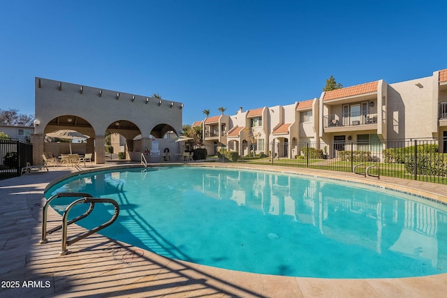 view of pool featuring a patio