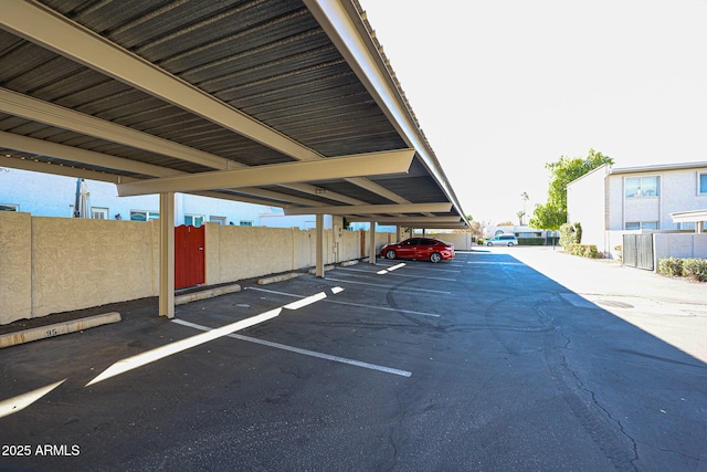 view of parking with a carport