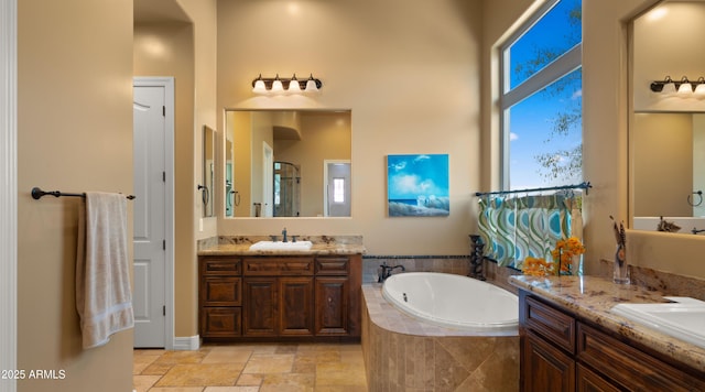 36813 N 109th Way, Scottsdale, AZ 85262 - bathroom with two vanities, a bath, a shower with door, and stone finish floors
