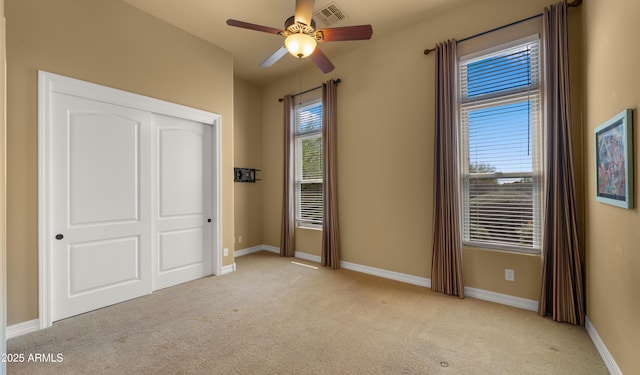 36813 N 109th Way, Scottsdale, AZ 85262 - unfurnished bedroom featuring light colored carpet, a closet, and ceiling fan