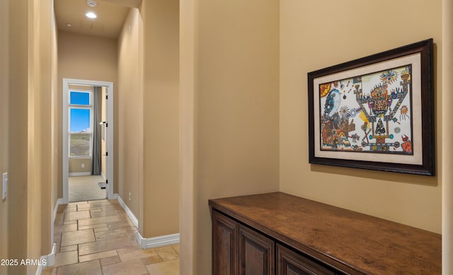 36813 N 109th Way, Scottsdale, AZ 85262 - hall with stone tile floors and baseboards