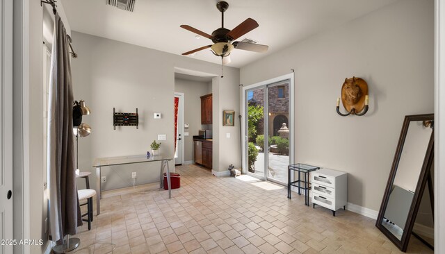 36813 N 109th Way, Scottsdale, AZ 85262 - living area with ceiling fan and brick patterned flooring