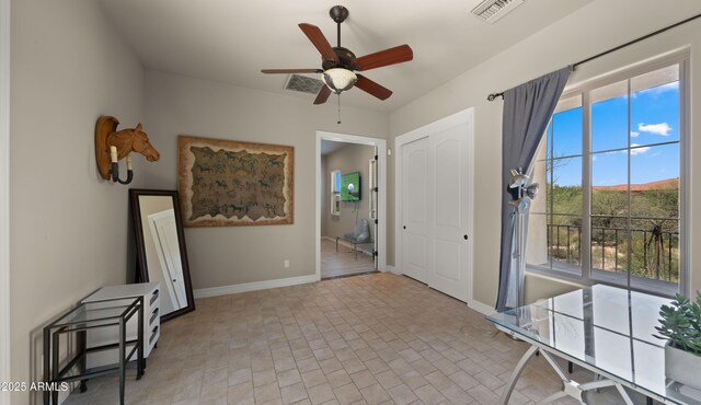 36813 N 109th Way, Scottsdale, AZ 85262 - unfurnished room with ceiling fan and brick patterned flooring