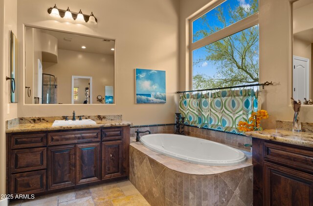 36813 N 109th Way, Scottsdale, AZ 85262 - full bathroom featuring vanity, a garden tub, and a shower with shower door