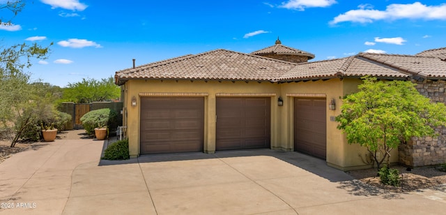 36813 N 109th Way, Scottsdale, AZ 85262 - view of front of home featuring stucco siding, a tiled roof, and an attached garage