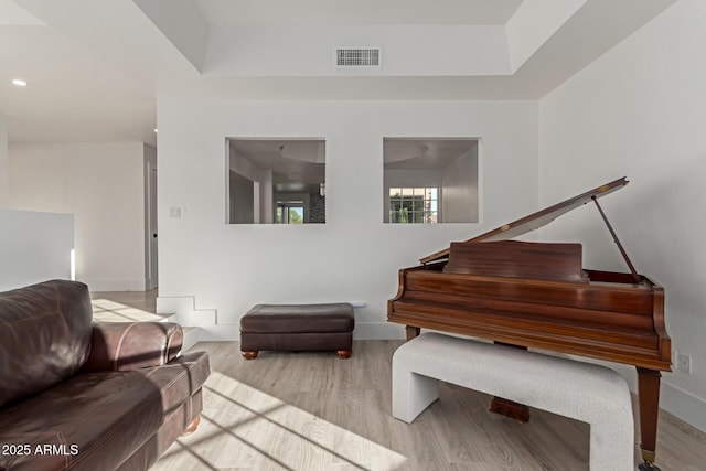 12015 S Tuzigoot Dr, Phoenix, AZ 85044 - living area featuring wood finished floors, baseboards, and recessed lighting