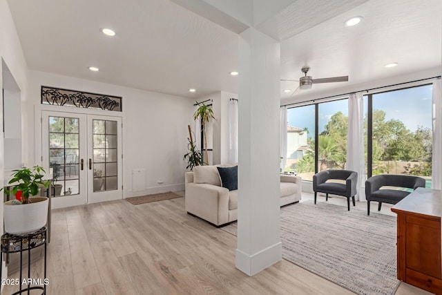 12015 S Tuzigoot Dr, Phoenix, AZ 85044 - living area featuring french doors, light wood-style floors, recessed lighting, a ceiling fan, and baseboards