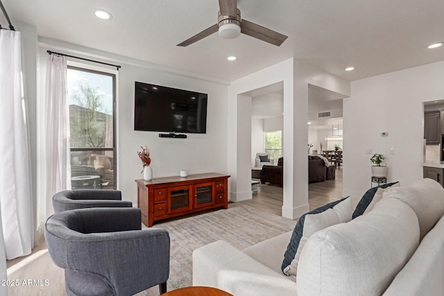 12015 S Tuzigoot Dr, Phoenix, AZ 85044 - living room featuring a ceiling fan, light wood-style flooring, recessed lighting, and baseboards