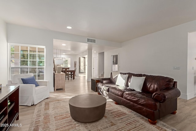 12015 S Tuzigoot Dr, Phoenix, AZ 85044 - living area with light wood-style floors, recessed lighting, and baseboards