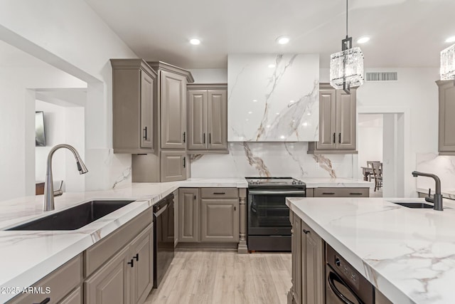 12015 S Tuzigoot Dr, Phoenix, AZ 85044 - kitchen with stainless steel range with electric stovetop, gray cabinets, a sink, and recessed lighting