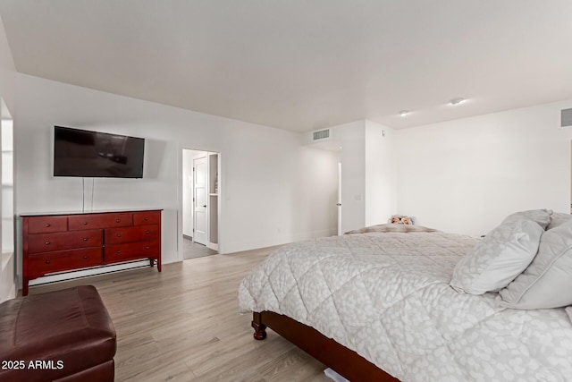 12015 S Tuzigoot Dr, Phoenix, AZ 85044 - bedroom with light wood-type flooring and baseboards