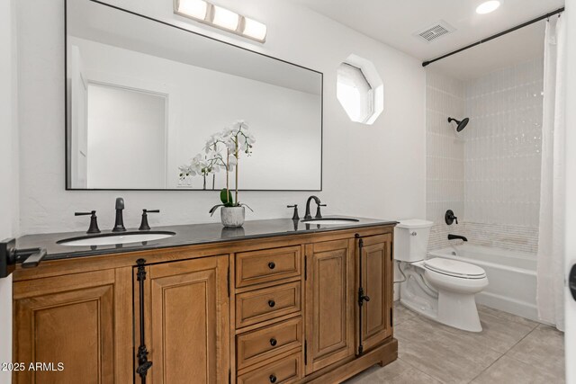 12015 S Tuzigoot Dr, Phoenix, AZ 85044 - full bathroom with double vanity, toilet, shower / bathtub combination with curtain, and tile patterned floors