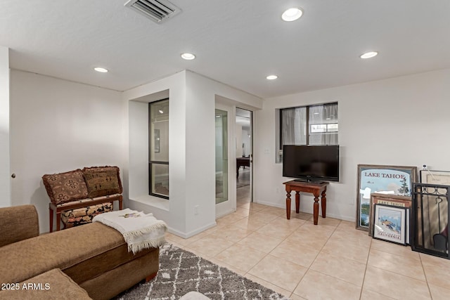 12015 S Tuzigoot Dr, Phoenix, AZ 85044 - living area featuring recessed lighting, light tile patterned flooring, and baseboards