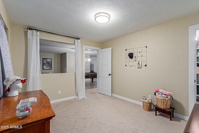 12015 S Tuzigoot Dr, Phoenix, AZ 85044 - sitting room featuring light colored carpet, baseboards, and a textured ceiling