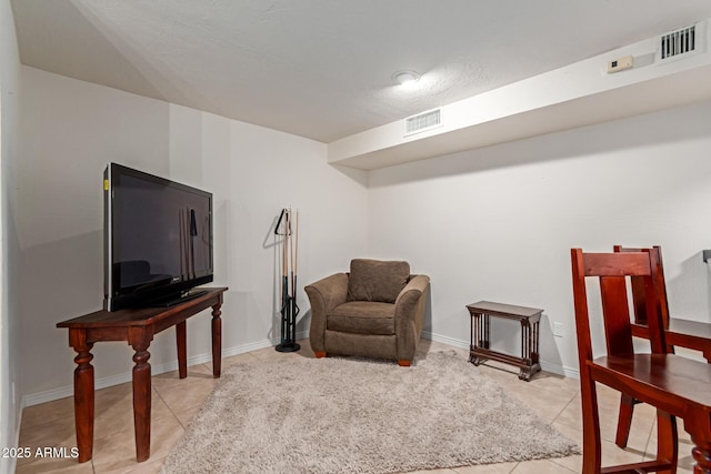 12015 S Tuzigoot Dr, Phoenix, AZ 85044 - living area with light tile patterned floors and baseboards