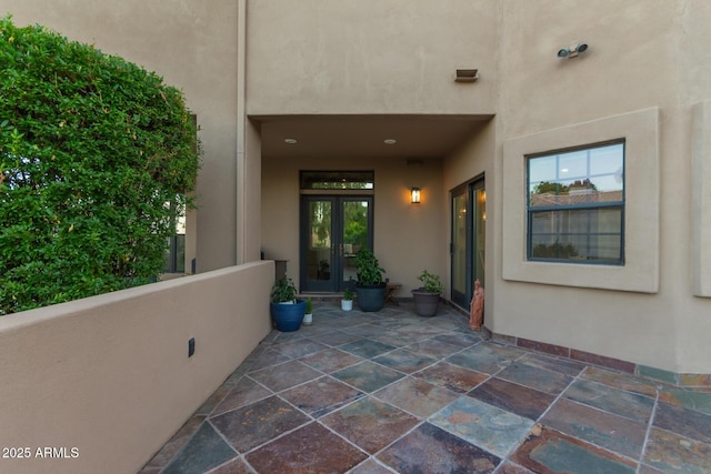 12015 S Tuzigoot Dr, Phoenix, AZ 85044 - entrance to property featuring stucco siding, a patio area, and french doors