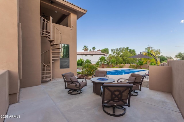 12015 S Tuzigoot Dr, Phoenix, AZ 85044 - view of patio featuring stairway and an outdoor fire pit