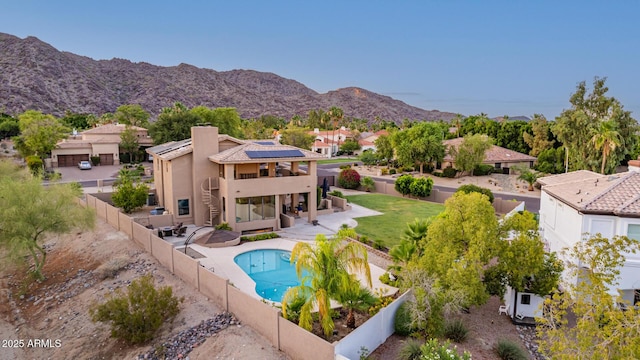 12015 S Tuzigoot Dr, Phoenix, AZ 85044 - view of pool featuring a fenced backyard, stairs, a patio, a residential view, and a mountain view