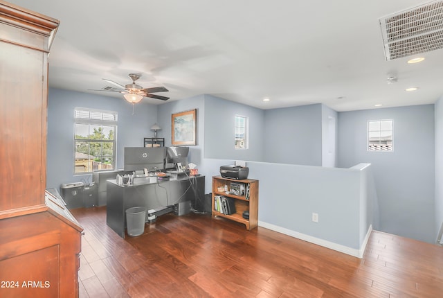 office area featuring ceiling fan and dark hardwood / wood-style flooring