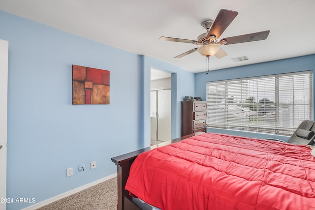 bedroom featuring ceiling fan and carpet floors