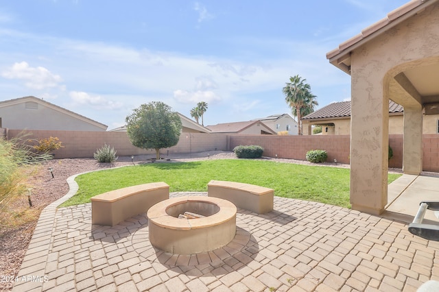 view of patio / terrace featuring a fire pit