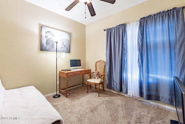 carpeted bedroom featuring ceiling fan