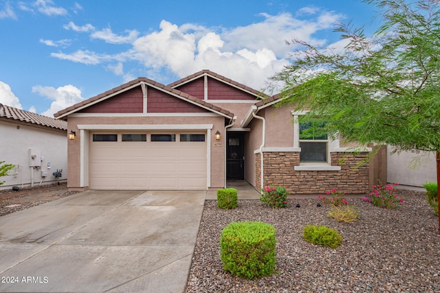 view of front of home with a garage