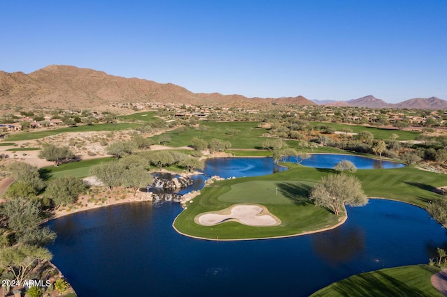 bird's eye view with a water and mountain view