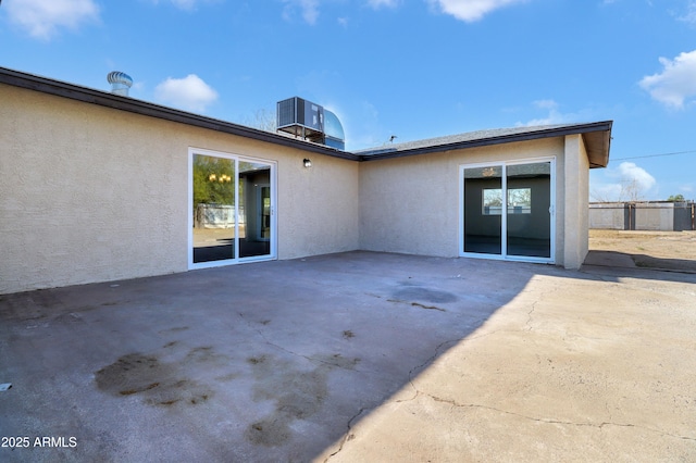 19118 W Fillmore St, Buckeye, AZ 85326 - back of property featuring stucco siding, a patio, and central air condition unit