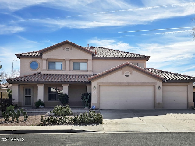 mediterranean / spanish-style house featuring a garage