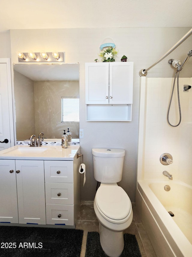 full bathroom featuring vanity, toilet, and  shower combination