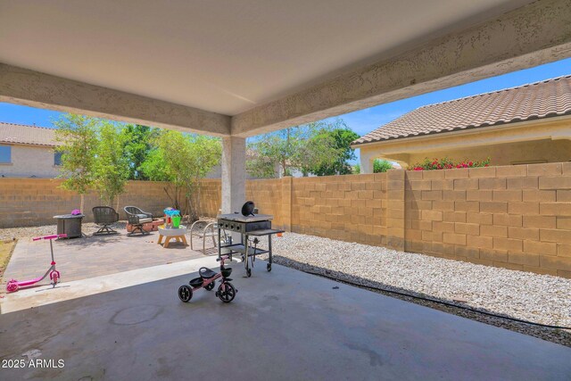 view of patio with a fenced backyard