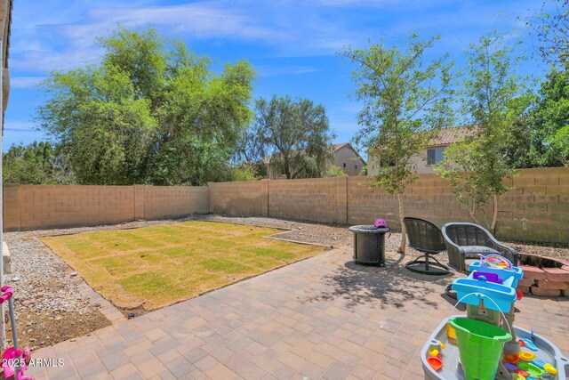 exterior space with a fenced backyard