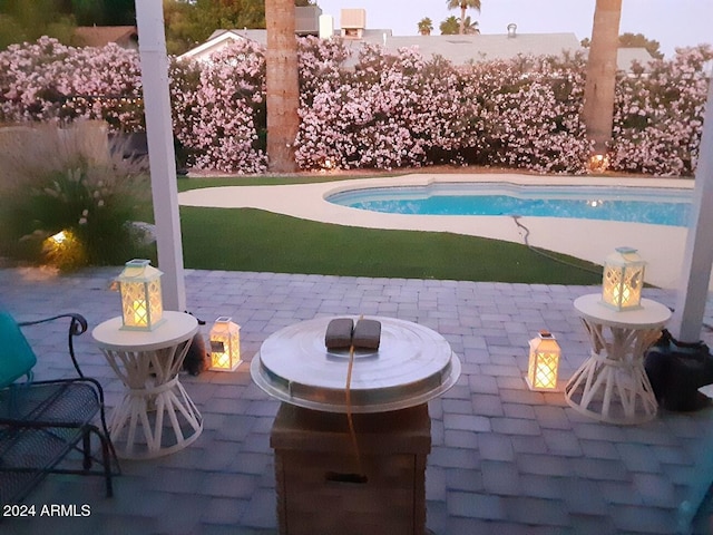 view of pool featuring a patio