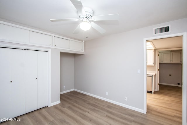 4502 E Carol Ave Unit 1, Mesa, AZ 85206 - unfurnished bedroom featuring light wood-type flooring, baseboards, ceiling fan, visible vents, and a closet