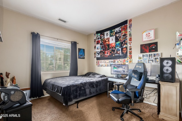 bedroom with carpet floors and visible vents