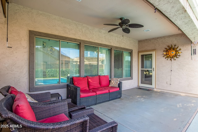 view of patio featuring visible vents, an outdoor living space, and a ceiling fan