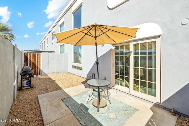 view of patio / terrace featuring a fenced backyard and grilling area