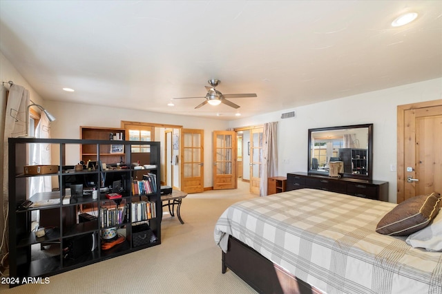 carpeted bedroom featuring ceiling fan and french doors