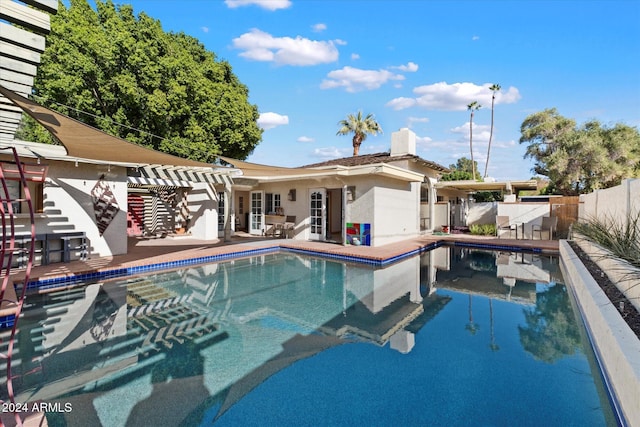 view of swimming pool with a pergola and a patio