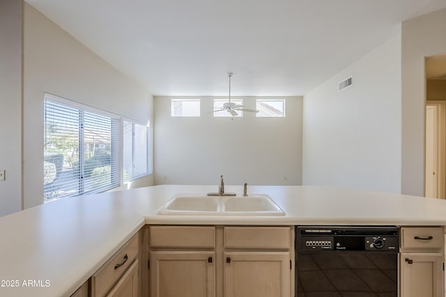 kitchen featuring black dishwasher, sink, kitchen peninsula, ceiling fan, and light brown cabinets