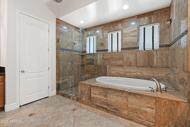 3215 E Constance Way, Phoenix, AZ 85042 - full bath featuring a garden tub, a stall shower, plenty of natural light, marble finish floors, and tile walls