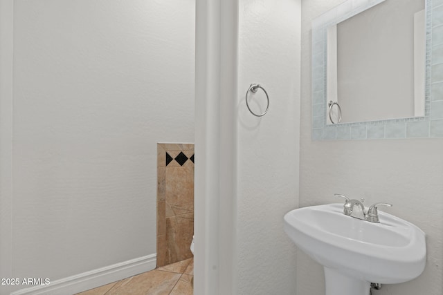3215 E Constance Way, Phoenix, AZ 85042 - bathroom with tile patterned floors and a textured wall