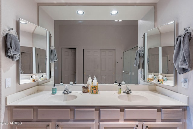 bathroom with double vanity and a sink